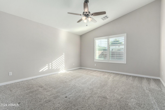 unfurnished room featuring carpet floors, ceiling fan, and vaulted ceiling