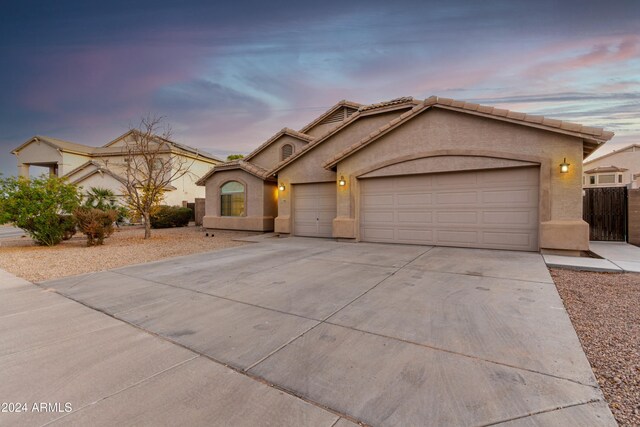 view of front of property featuring a garage