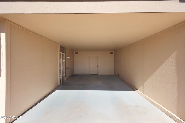 view of patio featuring an attached carport