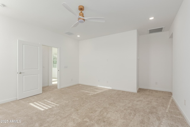 unfurnished room with light carpet, visible vents, baseboards, ceiling fan, and recessed lighting