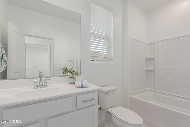 full bath featuring vanity and toilet