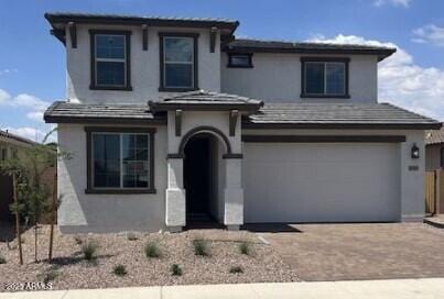 10860 E Tiburon Ave, Mesa, AZ 85212 - view of front of house featuring stucco siding, driveway, and a garage