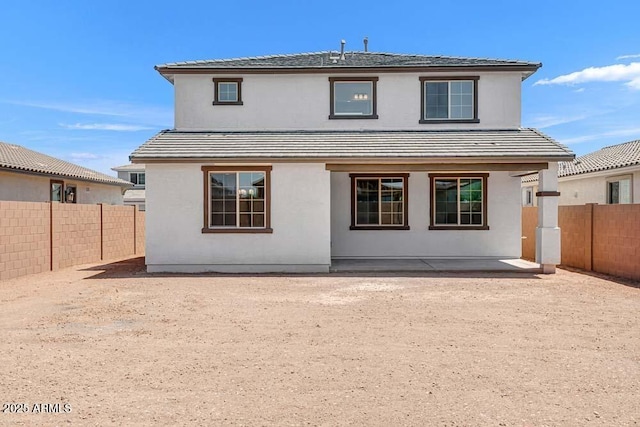 10860 E Tiburon Ave, Mesa, AZ 85212 - rear view of house featuring a fenced backyard, a patio area, and stucco siding