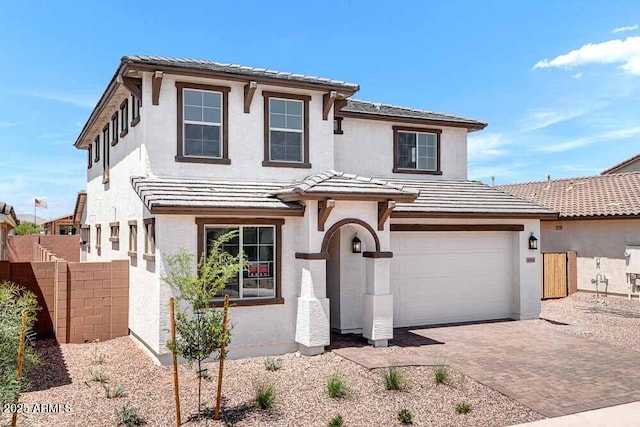 10860 E Tiburon Ave, Mesa, AZ 85212 - traditional home featuring decorative driveway, stucco siding, a tiled roof, and a garage