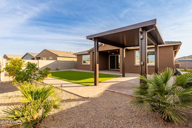 back of house featuring a patio