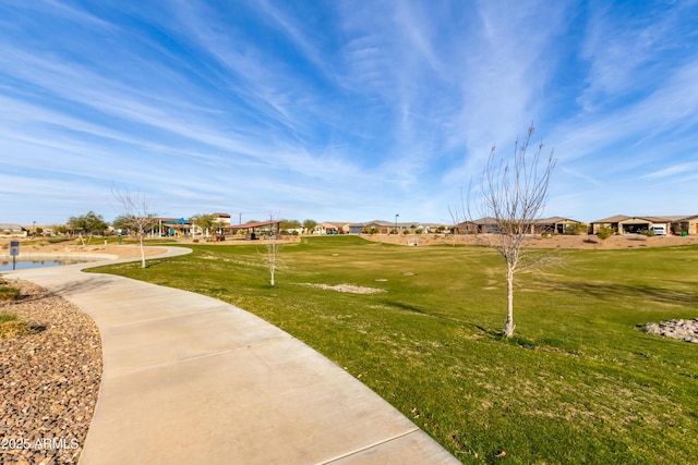 surrounding community with a lawn