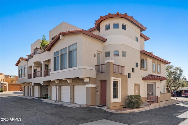 view of property featuring an attached garage