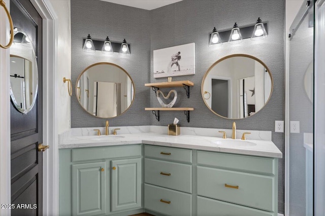 full bathroom with double vanity and a sink