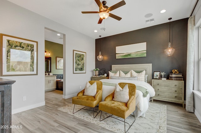 19420 W San Juan Ave, Litchfield Park, AZ 85340 - bedroom with baseboards, light wood-style flooring, recessed lighting, and connected bathroom