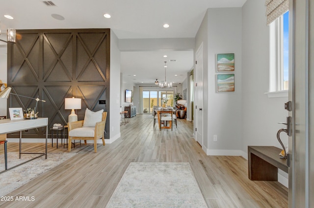 19420 W San Juan Ave, Litchfield Park, AZ 85340 - entrance foyer with baseboards, light wood-style floors, recessed lighting, and a chandelier