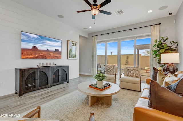 19420 W San Juan Ave, Litchfield Park, AZ 85340 - living room with wood finished floors, a ceiling fan, recessed lighting, and baseboards