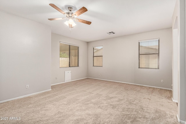 6826 W St Charles Ave, Laveen, AZ 85339 - empty room featuring light colored carpet and a ceiling fan