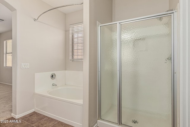 6826 W St Charles Ave, Laveen, AZ 85339 - bathroom with a shower stall and a garden tub
