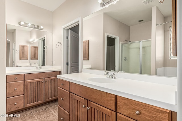 6826 W St Charles Ave, Laveen, AZ 85339 - full bathroom featuring a stall shower, vanity, and tile patterned flooring