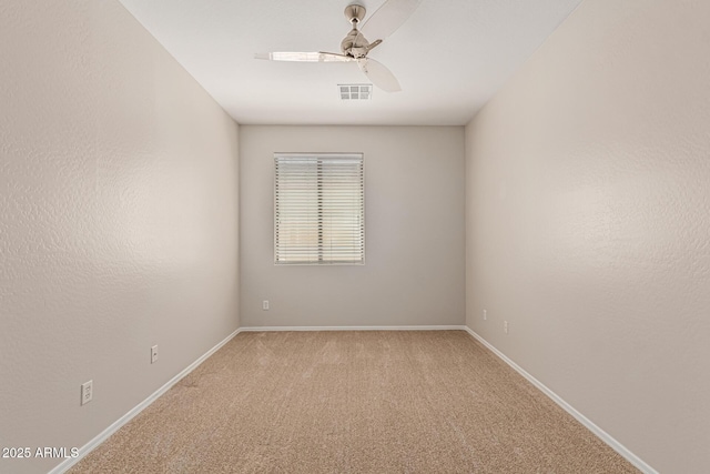 6826 W St Charles Ave, Laveen, AZ 85339 - carpeted spare room with a ceiling fan and baseboards