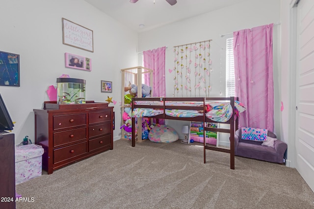 carpeted bedroom featuring ceiling fan