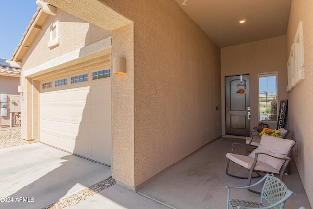 property entrance featuring a garage