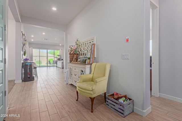 hallway with light wood-type flooring