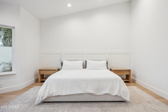 bedroom with light wood-type flooring