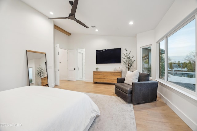 bedroom with high vaulted ceiling, beam ceiling, light hardwood / wood-style floors, and ceiling fan