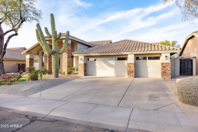 mediterranean / spanish-style home with a garage