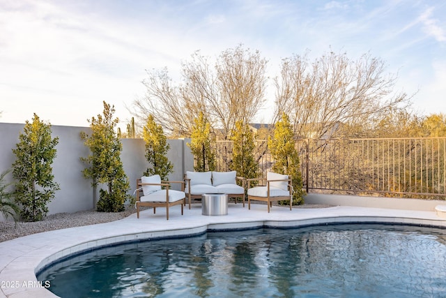 view of pool featuring a patio