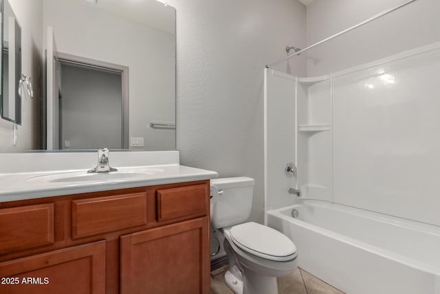 bathroom with tile patterned floors, shower / tub combination, toilet, and vanity