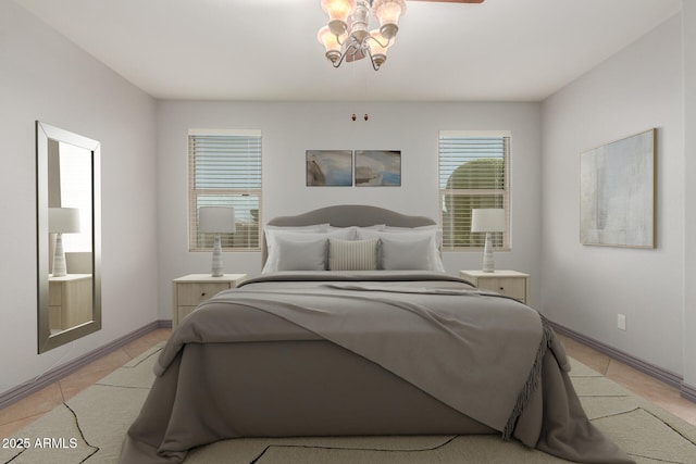 bedroom featuring light tile patterned flooring and baseboards