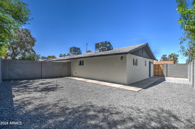 view of side of home featuring a patio