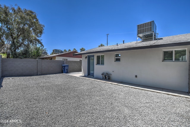 back of property featuring a patio