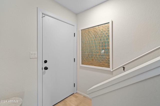 4620 N 68th St Unit 136, Scottsdale, AZ 85251 - foyer entrance featuring light wood-style floors
