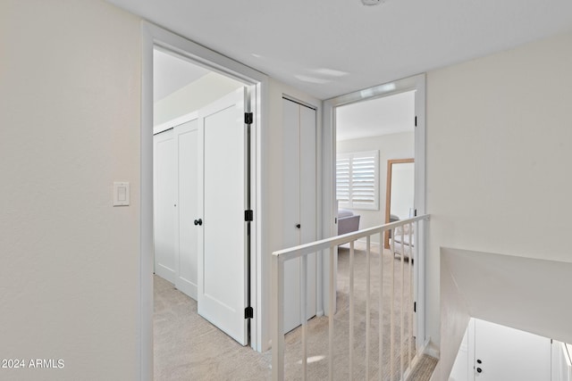 4620 N 68th St Unit 136, Scottsdale, AZ 85251 - hallway featuring light carpet and baseboards