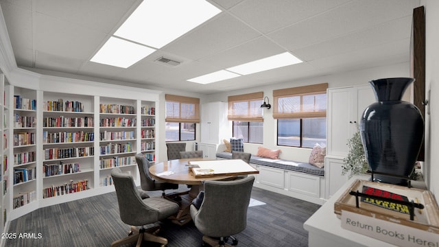 office space featuring a paneled ceiling