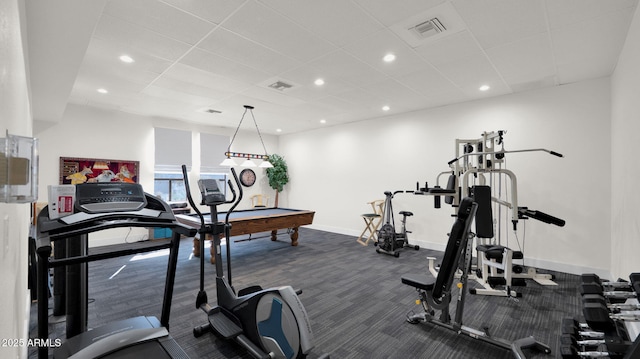 workout area featuring a drop ceiling