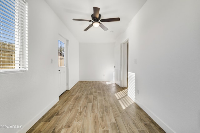 interior space with ceiling fan and light wood-type flooring