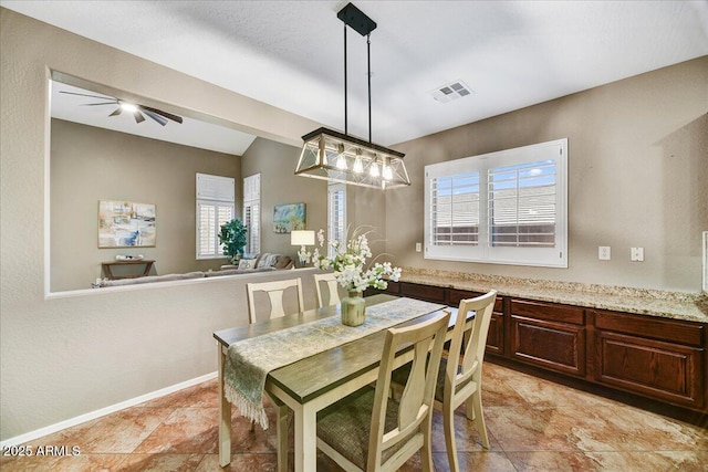 31133 N 132nd Ln, Peoria, AZ 85383 - dining area featuring ceiling fan and vaulted ceiling