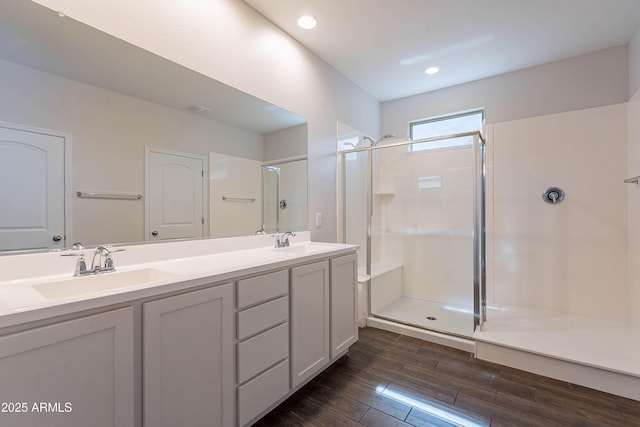 13523 W Remuda Dr, Peoria, AZ 85383 - full bath featuring a shower stall, wood finished floors, double vanity, and recessed lighting