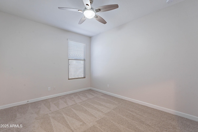 13523 W Remuda Dr, Peoria, AZ 85383 - spare room featuring light colored carpet, baseboards, and a ceiling fan