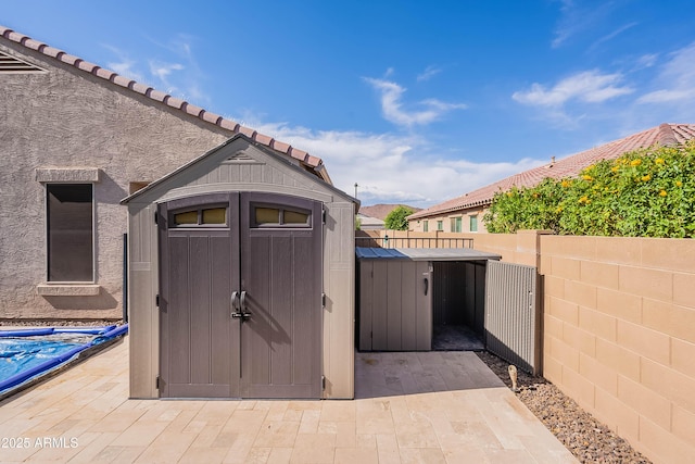 13523 W Remuda Dr, Peoria, AZ 85383 - view of shed with fence