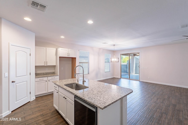 13523 W Remuda Dr, Peoria, AZ 85383 - kitchen featuring a sink, dark wood-style floors, white cabinets, baseboards, and open floor plan