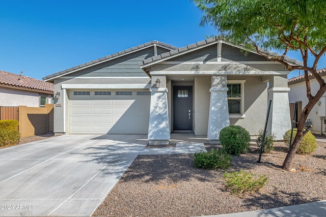 view of front of property with a garage