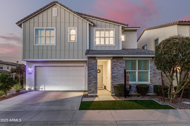 view of front of property with a garage