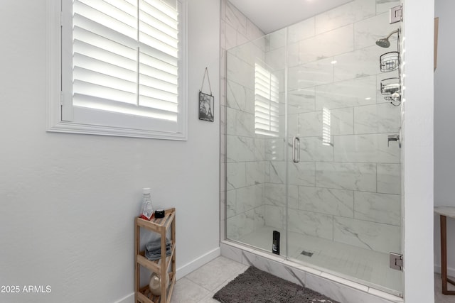 bathroom featuring tile patterned floors and an enclosed shower