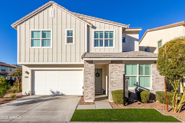 view of front of home with a garage