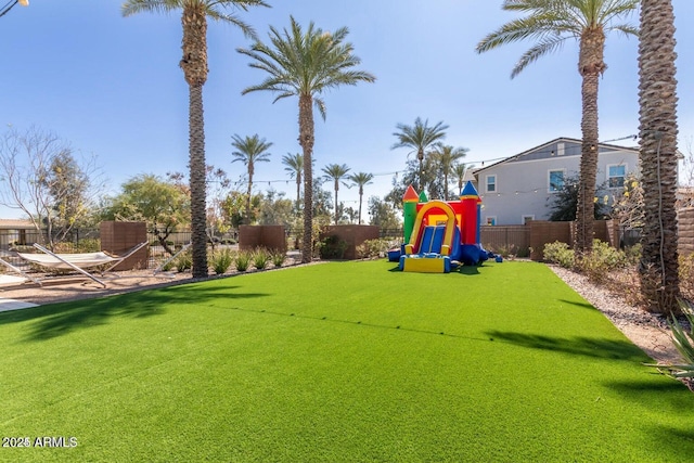 view of play area with a yard