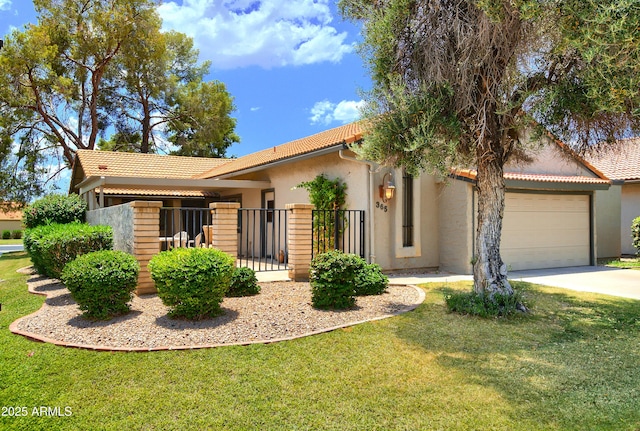 365 Leisure World, Mesa, AZ 85206 - view of front facade with stucco siding, a tile roof, an attached garage, and driveway