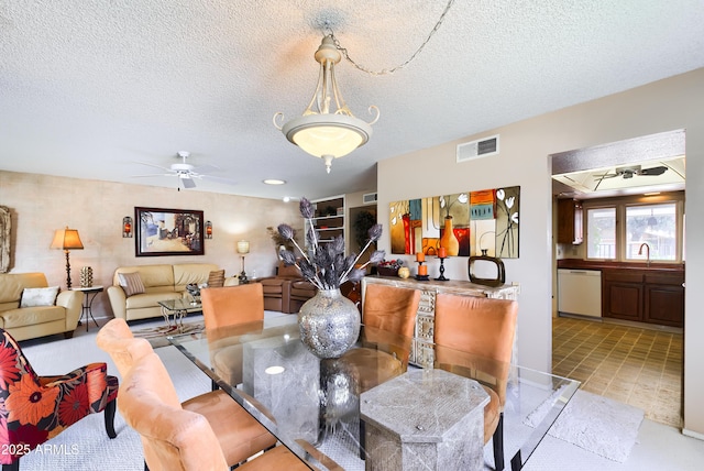 365 Leisure World, Mesa, AZ 85206 - dining area featuring a ceiling fan and a textured ceiling