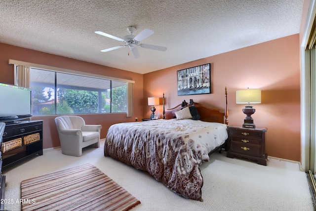 365 Leisure World, Mesa, AZ 85206 - carpeted bedroom with a ceiling fan, a textured ceiling, and baseboards