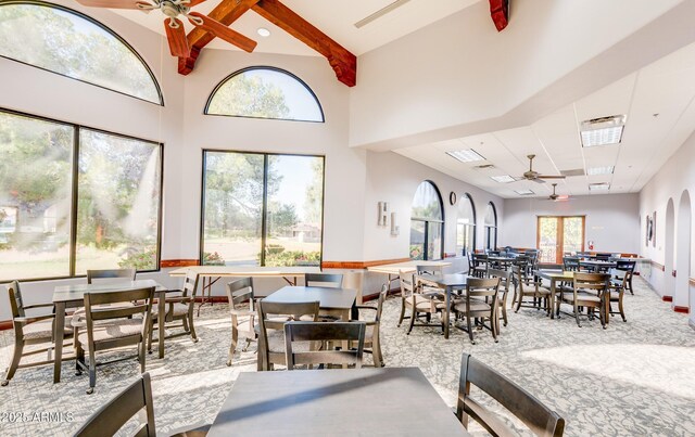 365 Leisure World, Mesa, AZ 85206 - dining area featuring ceiling fan, carpet flooring, and beam ceiling
