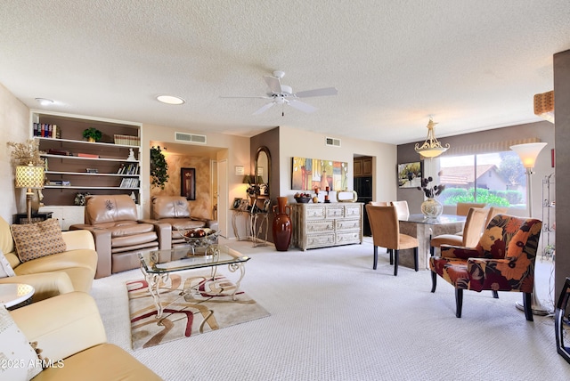365 Leisure World, Mesa, AZ 85206 - living room with light colored carpet, a textured ceiling, and a ceiling fan